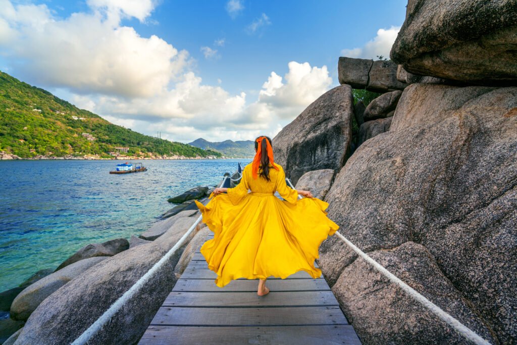Beautiful Girl Running On Wooden Path At Koh Nang Yuan Island Ne